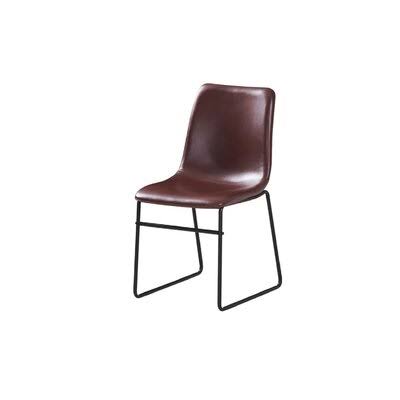 Dining Chair with Metal Legs Black Finish and Upholstered in Leatherette Ivy Bronx Upholstery Color: Cognac EOP1_Z2NEY64